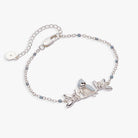 Silver Tufted Titmouse Bird Bracelet from ALEX AND ANI featuring a detailed bird charm on a sleek bracelet.