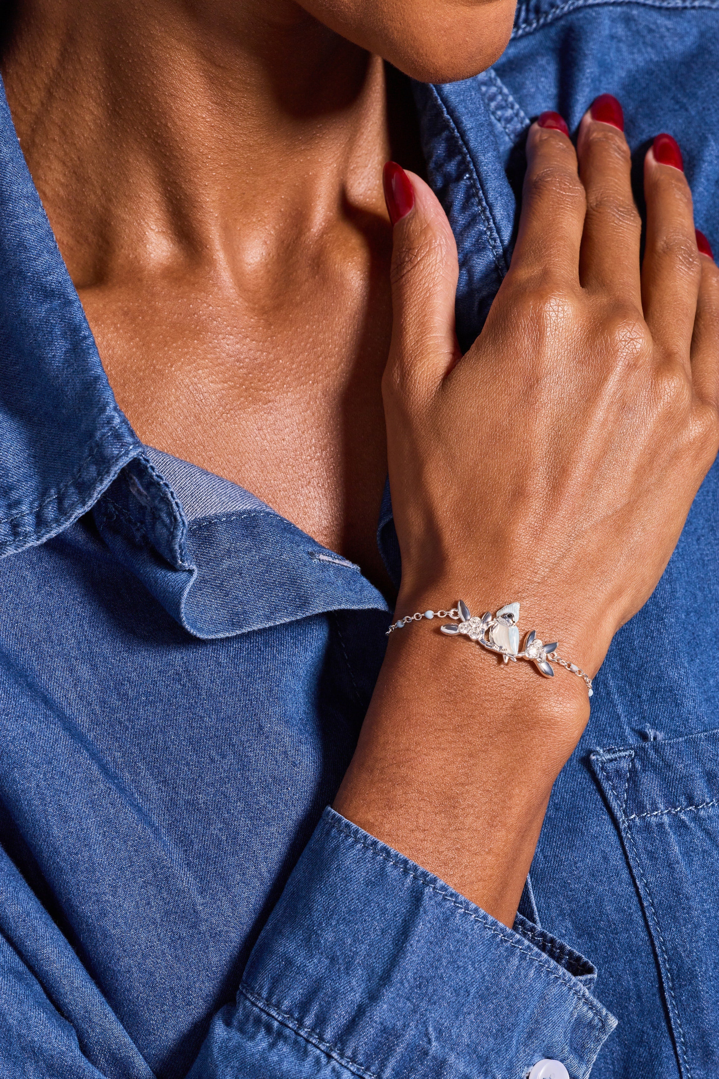 Silver Tufted Titmouse Bird bracelet by ALEX AND ANI featuring a detailed bird charm on a sleek bracelet band.