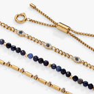Set of ALEX AND ANI Evil Eye Stranded™ bracelets in stainless steel and gold with eye charm accents, stylish jewelry accessories.