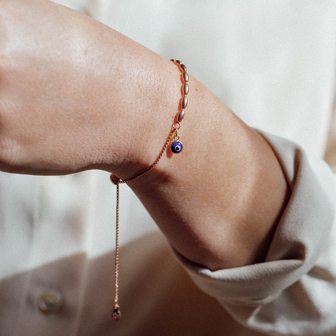 Sterling silver Evil Eye Pull Chain Bracelet by ALEX AND ANI featuring an eye charm and adjustable chain for a stylish look.