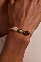 Tri-tone Coffee Bean Bolo Bracelet by Alex and Ani featuring a stylish coffee bean charm on adjustable bracelet.