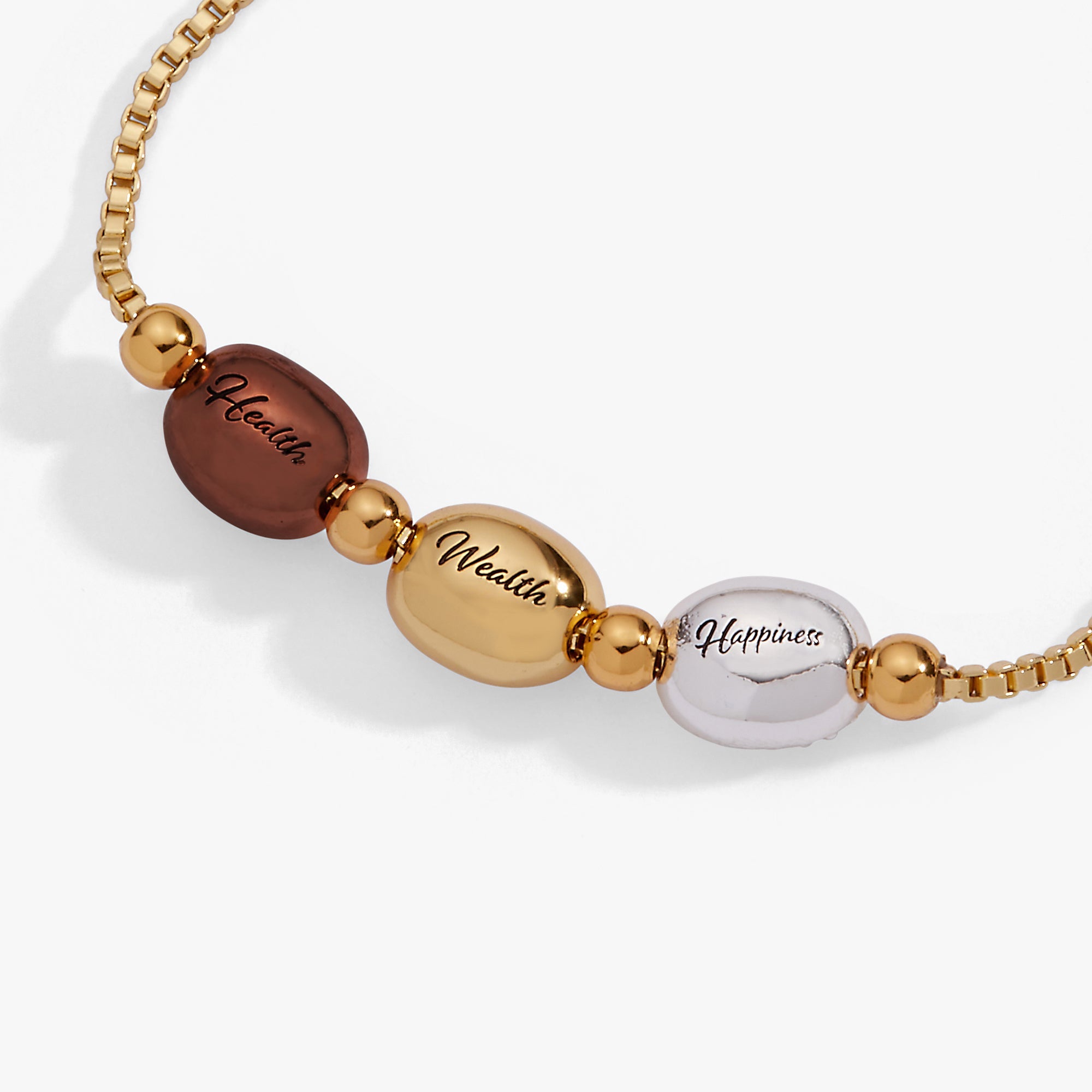 Alex and Ani Coffee Bean Bolo Bracelet featuring tri-tone metal design and adjustable slide closure.