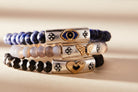 Two-tone antique evil eye stretch bracelet by ALEX AND ANI featuring a protective evil eye charm and elegant design.