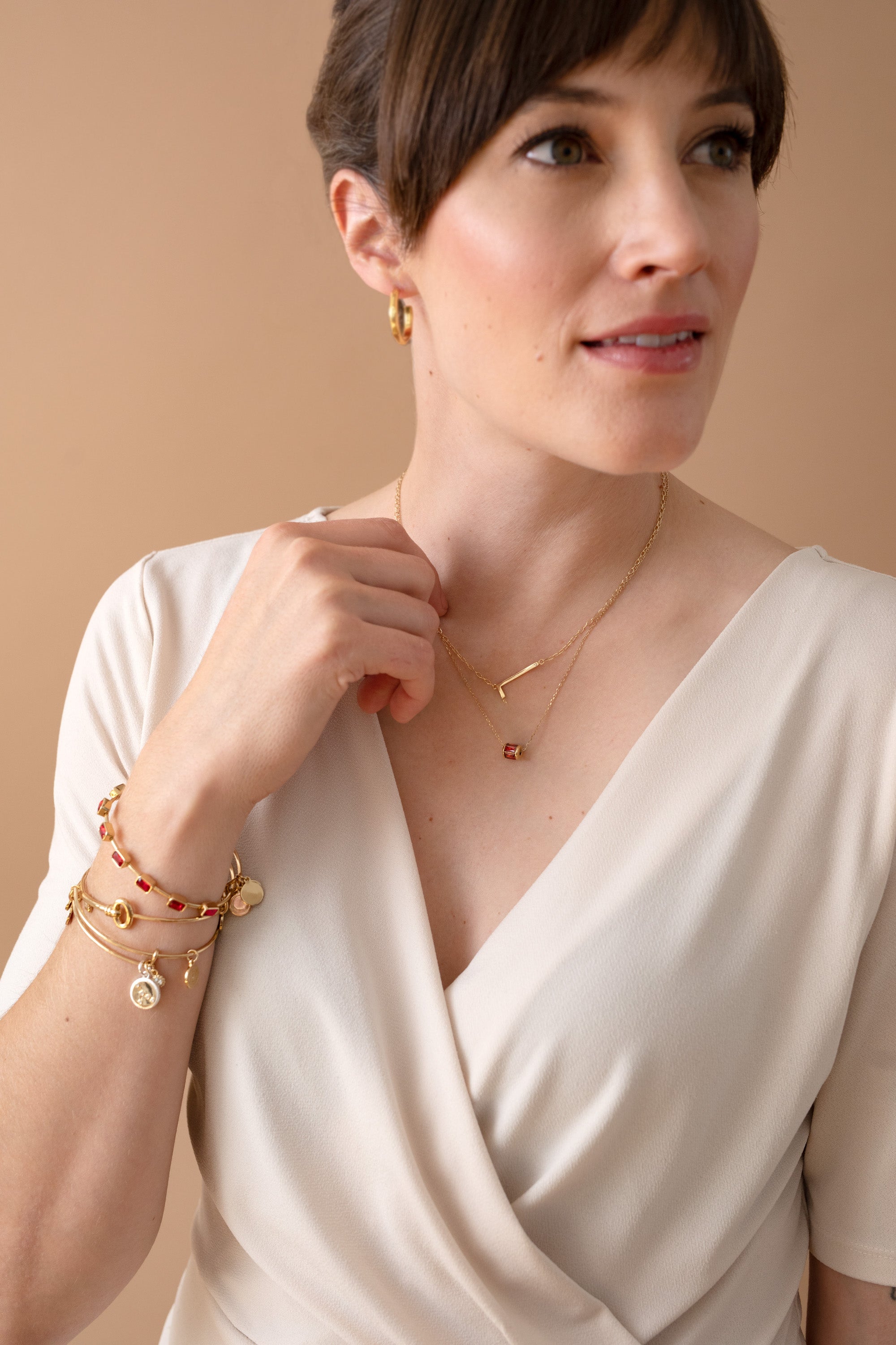 Two-tone Cancer zodiac charm bangle bracelet by ALEX AND ANI featuring a detailed Cancer symbol and elegant design.