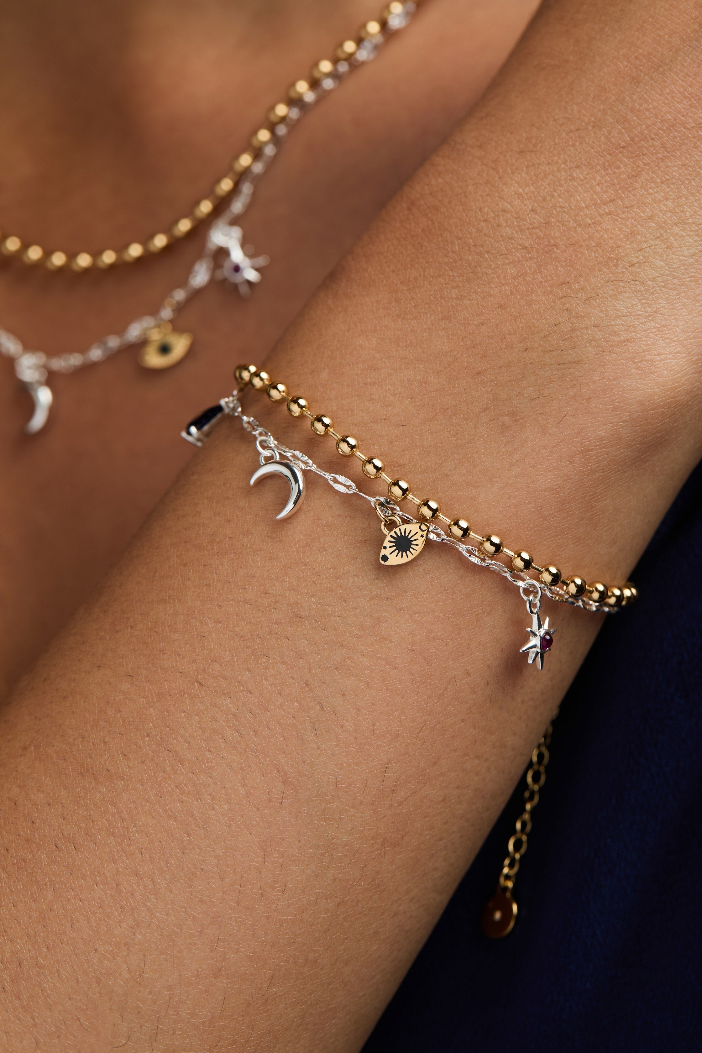 Two-tone Moon Magic 2 Row Charm Bracelet by ALEX AND ANI featuring celestial themed charms and layered design.