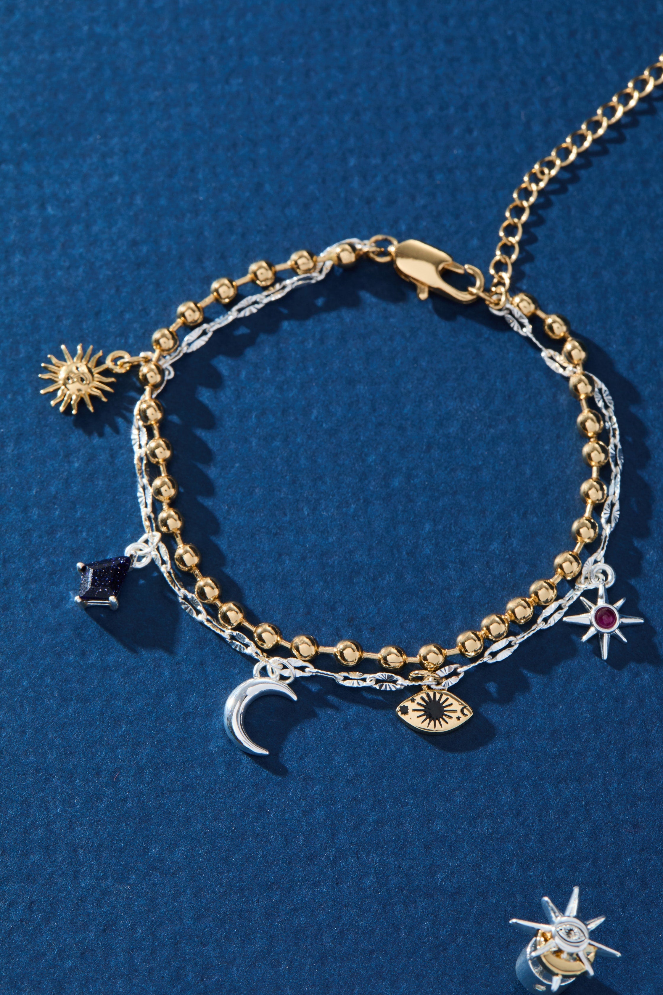 Two-tone Moon Magic 2 Row Charm Bracelet by ALEX AND ANI featuring celestial moon charms and layered design.