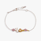 ALEX AND ANI PEEPS® Precious Peepsake Bracelet featuring two-tone metal charms on a delicate bracelet.