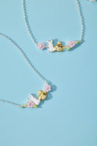 Two-tone PEEPS® Precious Peepsake Bracelet by ALEX AND ANI featuring colorful beaded charms on a silver and gold-tone chain.