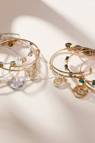 Two-tone Sagittarius zodiac charm bangle bracelet by ALEX AND ANI featuring a celestial Sagittarius charm and sleek design.