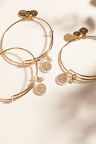 ALEX AND ANI Scorpio Zodiac Charm Bangle with two-tone metal design, featuring a Scorpio symbol charm on a sleek bracelet.