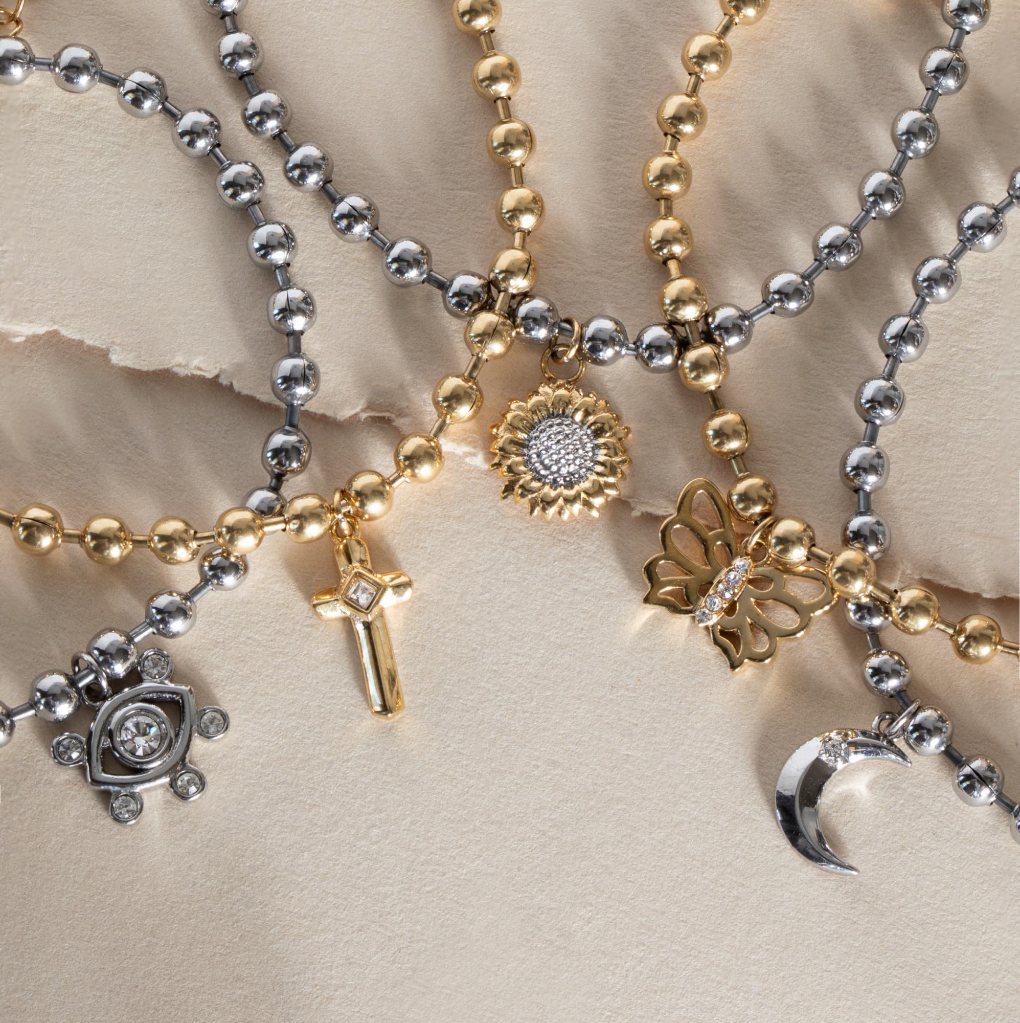 ALEX AND ANI sunflower ball chain bracelet featuring two-tone stainless steel design with sunflower accents.
