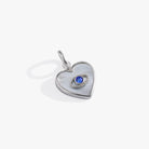 Silver Evil Eye Heart Interchangeable Charm from ALEX AND ANI, featuring a stainless steel charm with a detailed evil eye design.