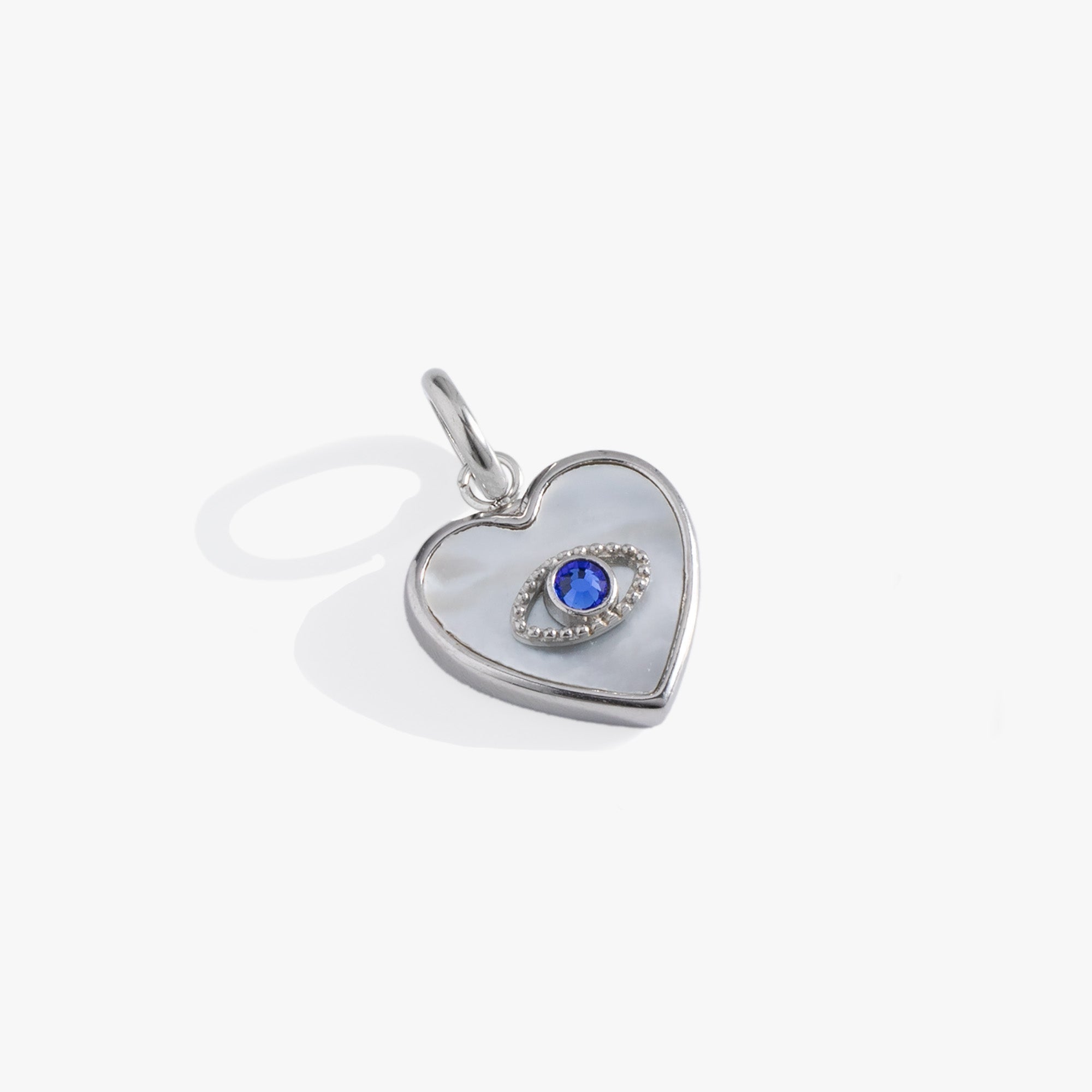 Silver Evil Eye Heart Interchangeable Charm from ALEX AND ANI, featuring a stainless steel charm with a detailed evil eye design.