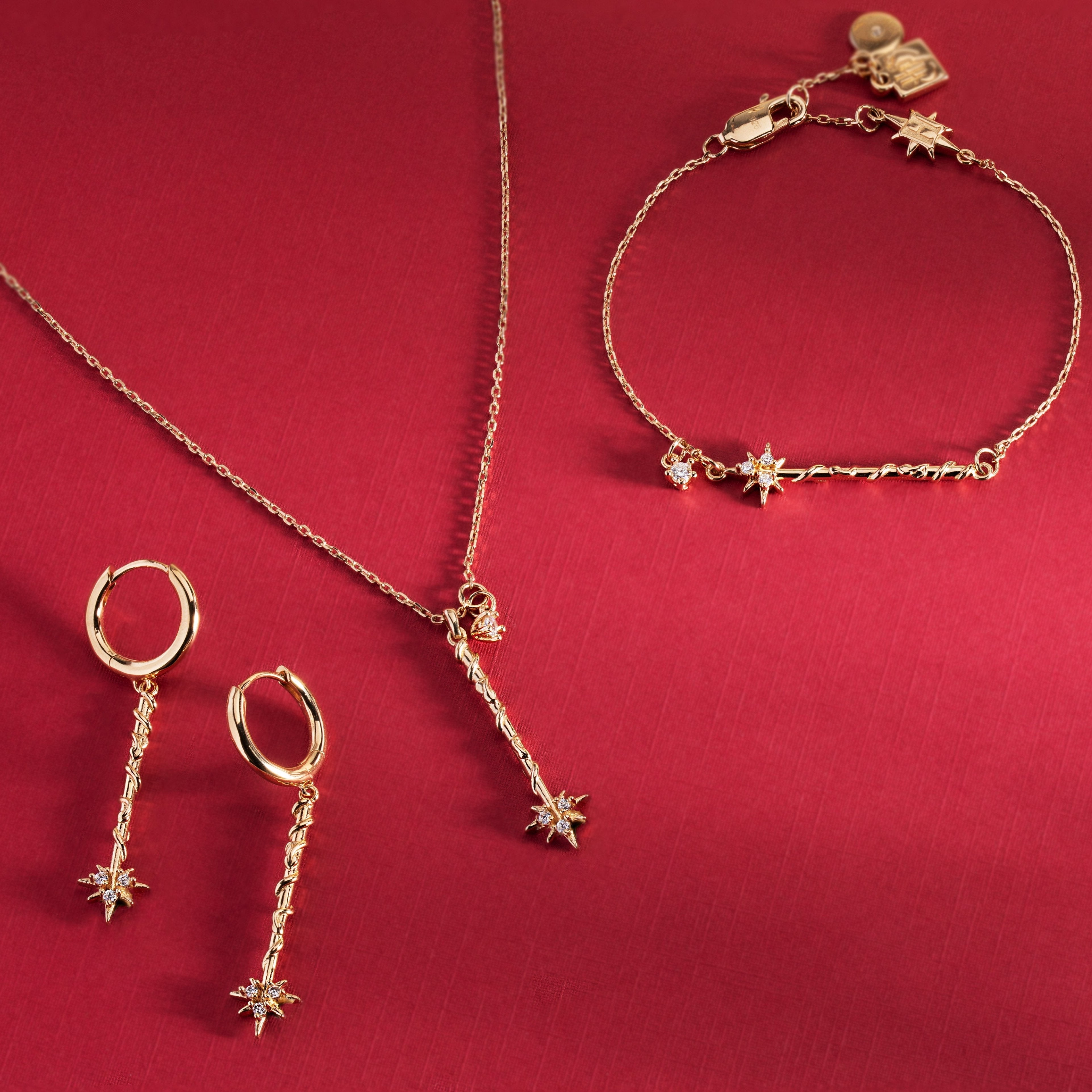 Gold-over-sterling silver Hermione Wand earrings from Harry Potter™ by ALEX AND ANI, featuring detailed wand design.