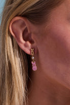 Gold PEEPS® statement earrings by ALEX AND ANI featuring bold, eye-catching jewelry with intricate detailing.
