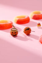 Set of three Halloween-themed gold earrings from ALEX AND ANI featuring Trick or Treat designs for festive style.