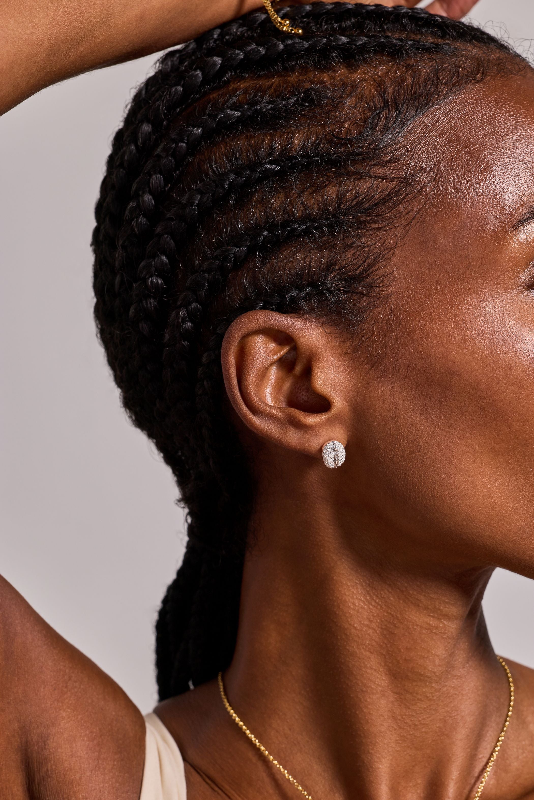 Silver coffee bean pave crystal stud earrings by Alex and Ani featuring sparkling crystal accents on a sleek earring design.