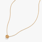 Gold Harry Potter Time Turner necklace by ALEX AND ANI, with intricate silver and gold-toned design on a chain.