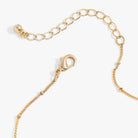 Antique gold Moon and Sun multicharm necklace by ALEX AND ANI featuring celestial charms on a delicate chain.