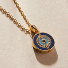 Gold Evil Eye 'Positive Vibes' mantra necklace by ALEX AND ANI featuring a protective eye charm and uplifting message.