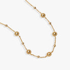 Gold Floret Chain Necklace by ALEX AND ANI featuring delicate floral-inspired chain design in a close-up image.
