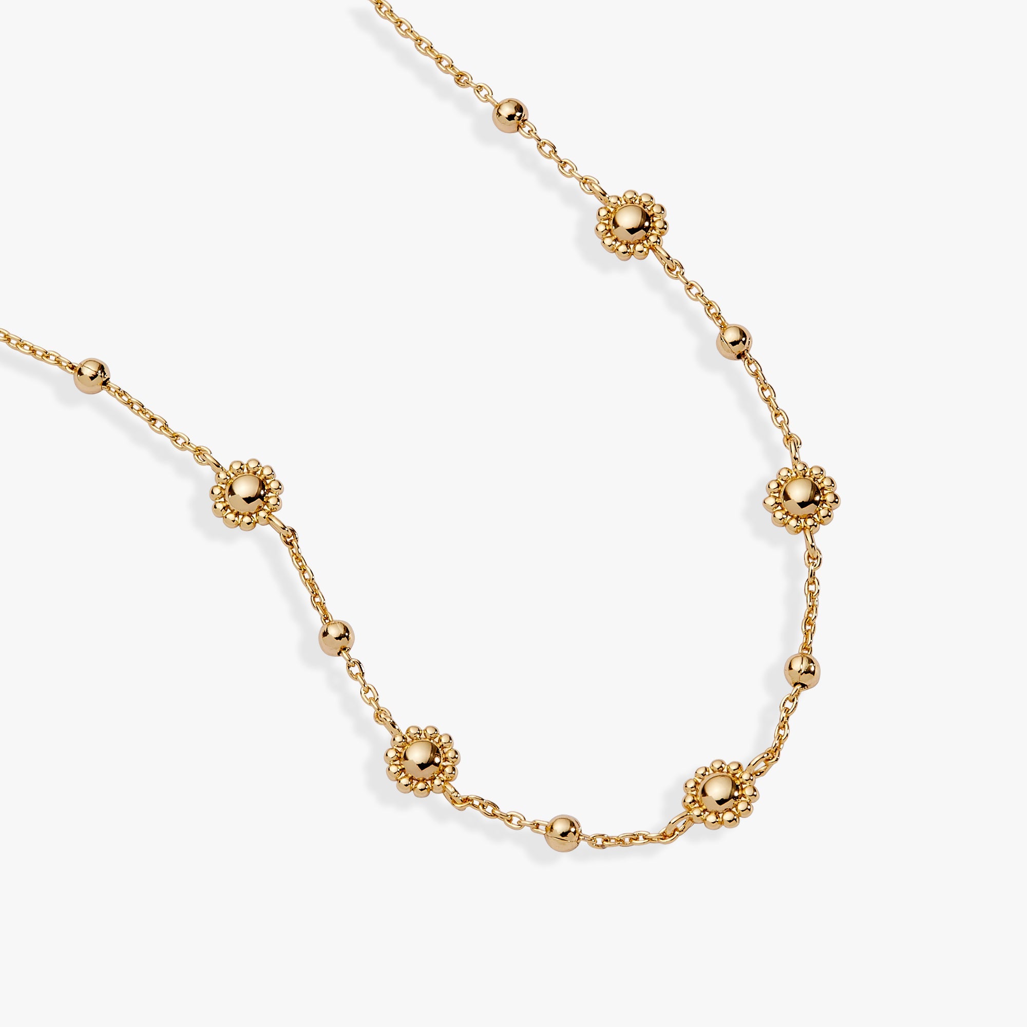 Gold Floret Chain Necklace by ALEX AND ANI featuring delicate floral-inspired chain design in a close-up image.