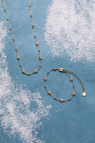 Gold Floret Chain Necklace by ALEX AND ANI featuring delicate floral-inspired links on a fine chain.