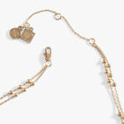 Gold Harry Potter Flying Keys Necklace by ALEX AND ANI featuring a detailed key pendant on a delicate chain.