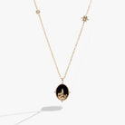 Gold Harry Potter Hogwarts pendant necklace by ALEX AND ANI featuring the iconic Hogwarts crest charm.