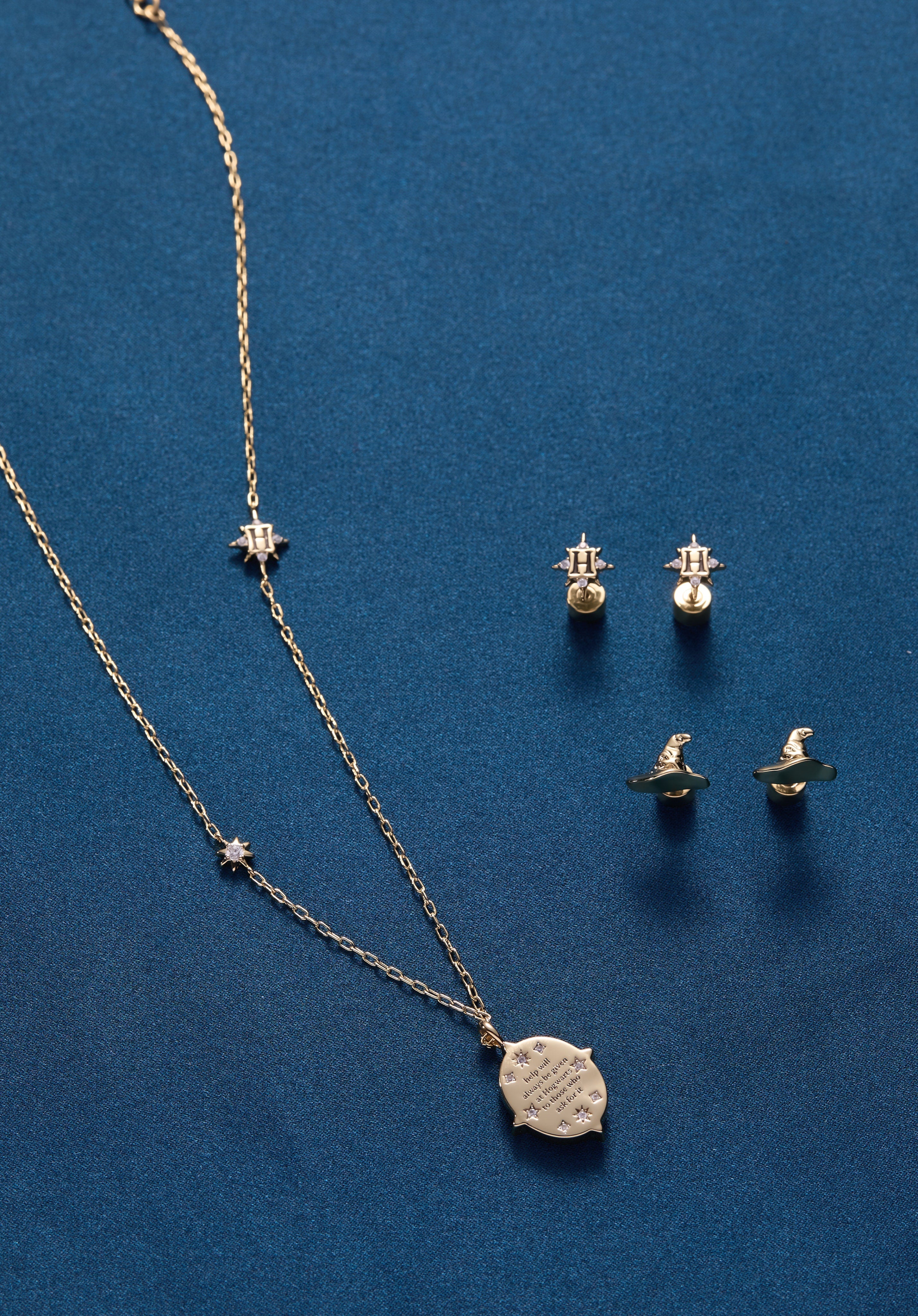 Gold Harry Potter Hogwarts pendant necklace by ALEX AND ANI featuring a detailed Hogwarts crest charm.