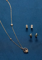 Gold Harry Potter Hogwarts Pendant Necklace by ALEX AND ANI featuring iconic Hogwarts crest and magical design.