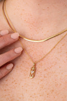 Gold Love and Luck Pendant Necklace by ALEX AND ANI featuring a charming charm on a delicate chain.