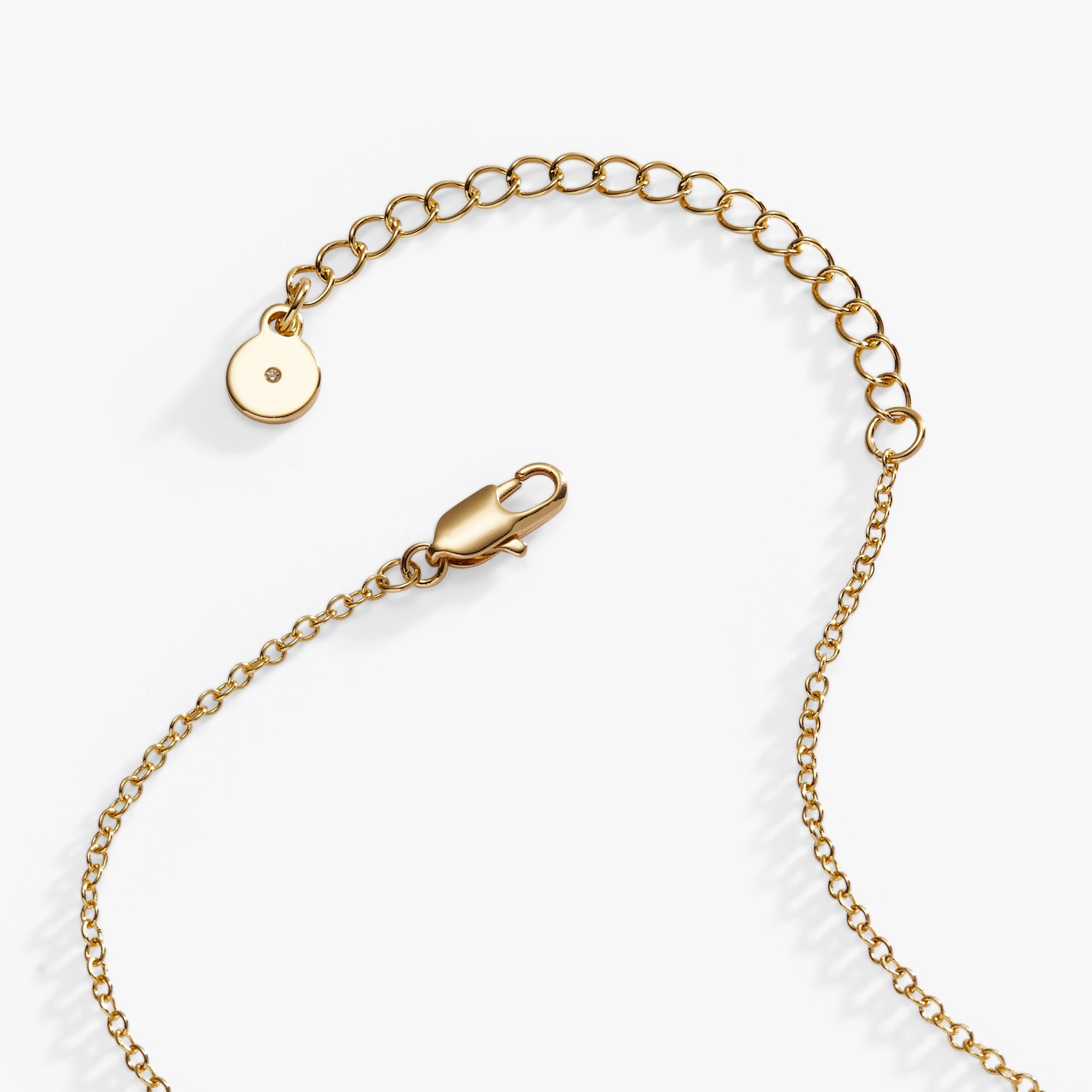 Gold Love and Luck Pendant Necklace by ALEX AND ANI featuring a heart and four-leaf clover charm on a delicate chain.