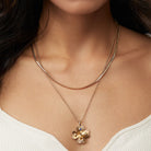 Gold Lucky Four Leaf Clover Adjustable Necklace by ALEX AND ANI featuring a delicate pendant on a fine chain.