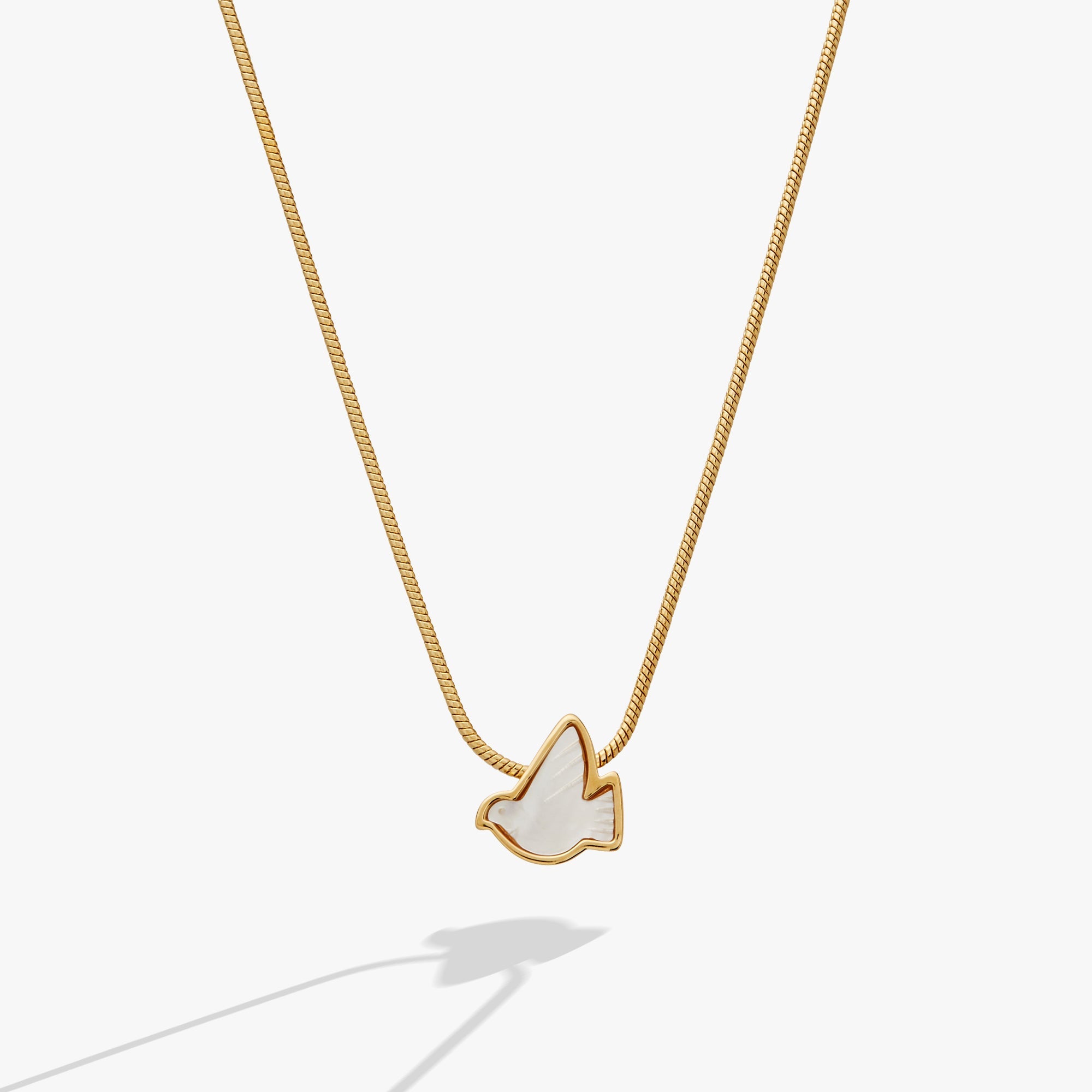 Gold pearlized Dove 'Peace' slider necklace by ALEX AND ANI featuring a dove charm on a sleek chain.