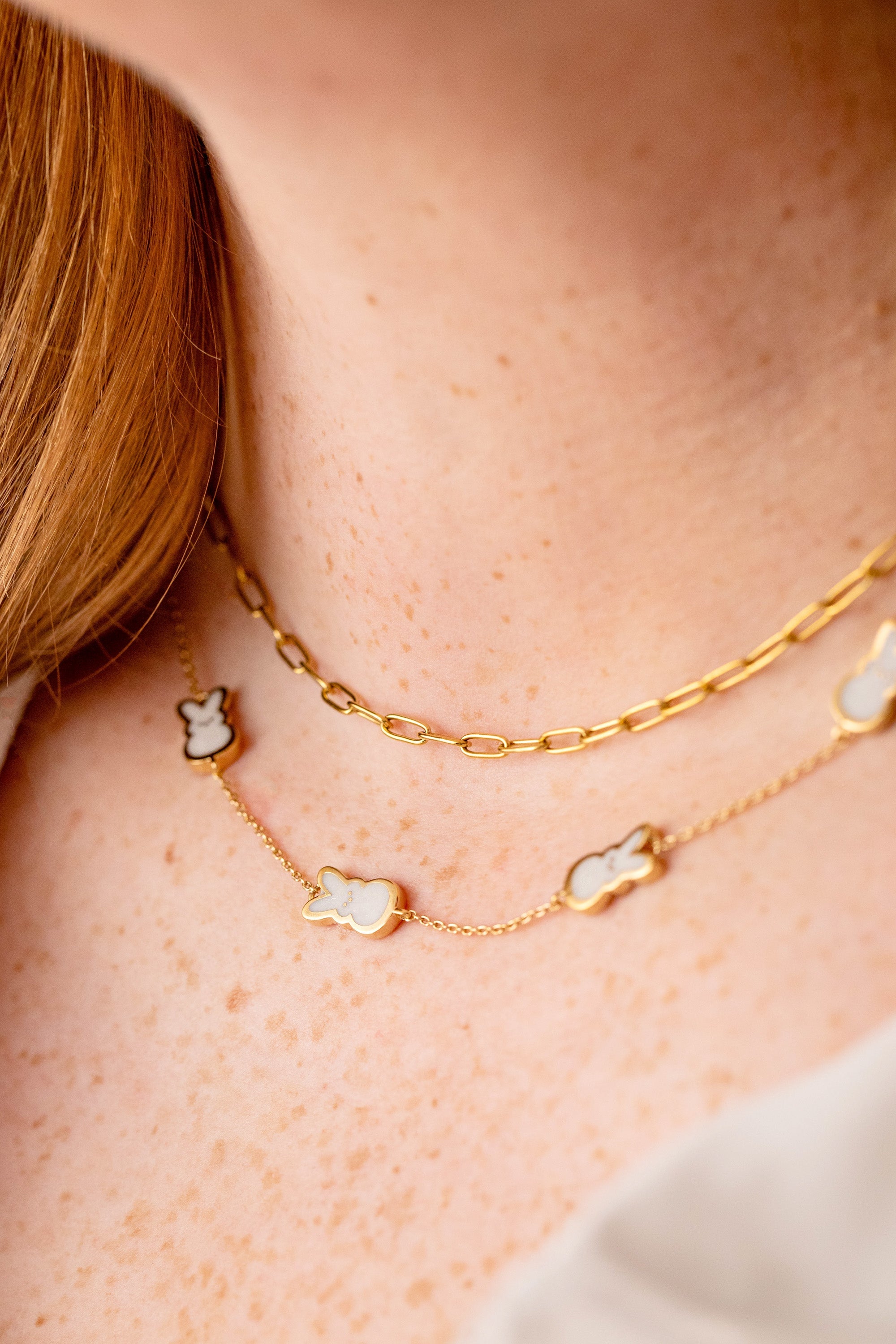 Gold necklace featuring a pearlized bunny charm from ALEX AND ANI PEEPS® collection.