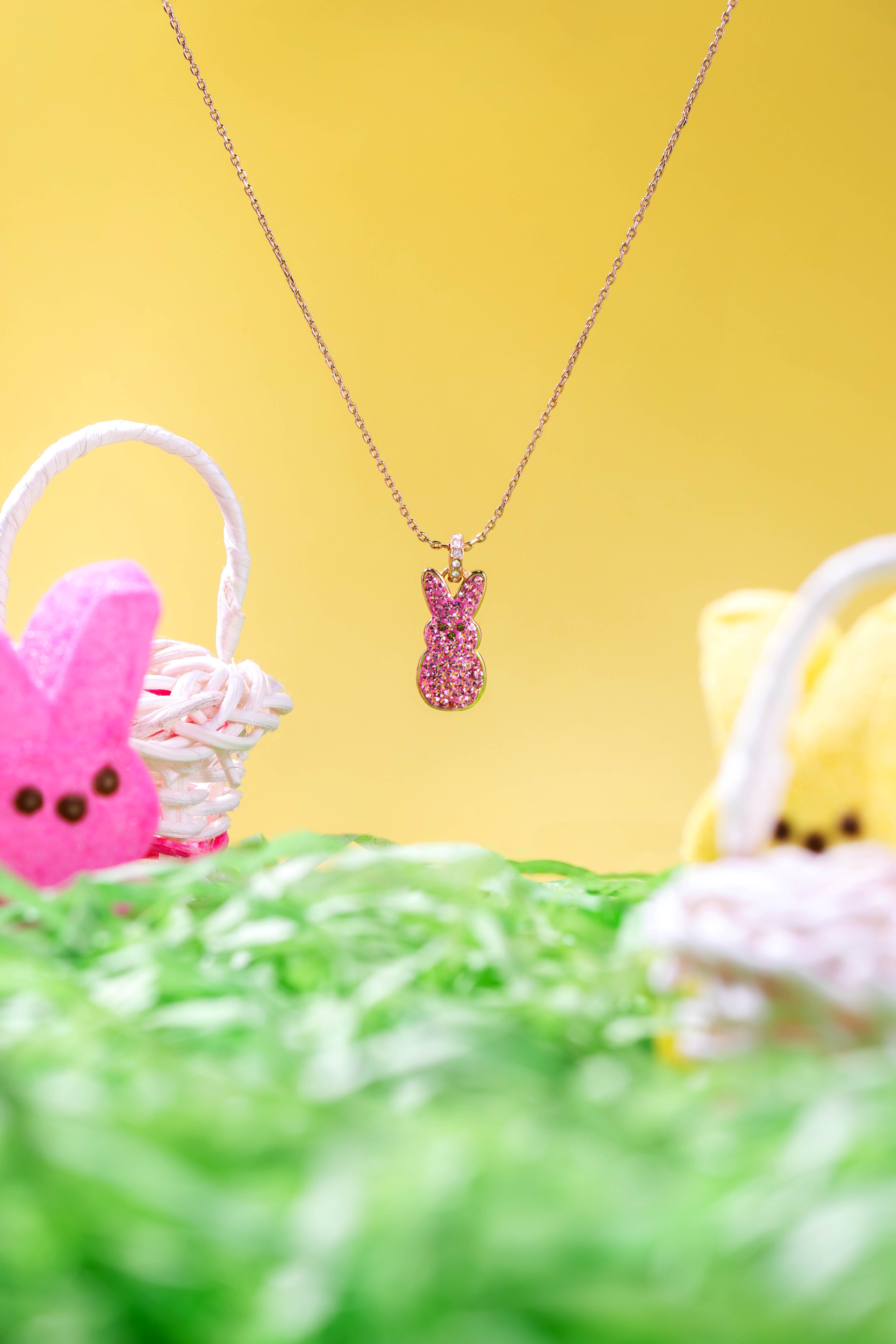 ALEX AND ANI pink crystal bunny pendant necklace featuring a gold-toned chain and adorable bunny charm, perfect for jewelry collection.