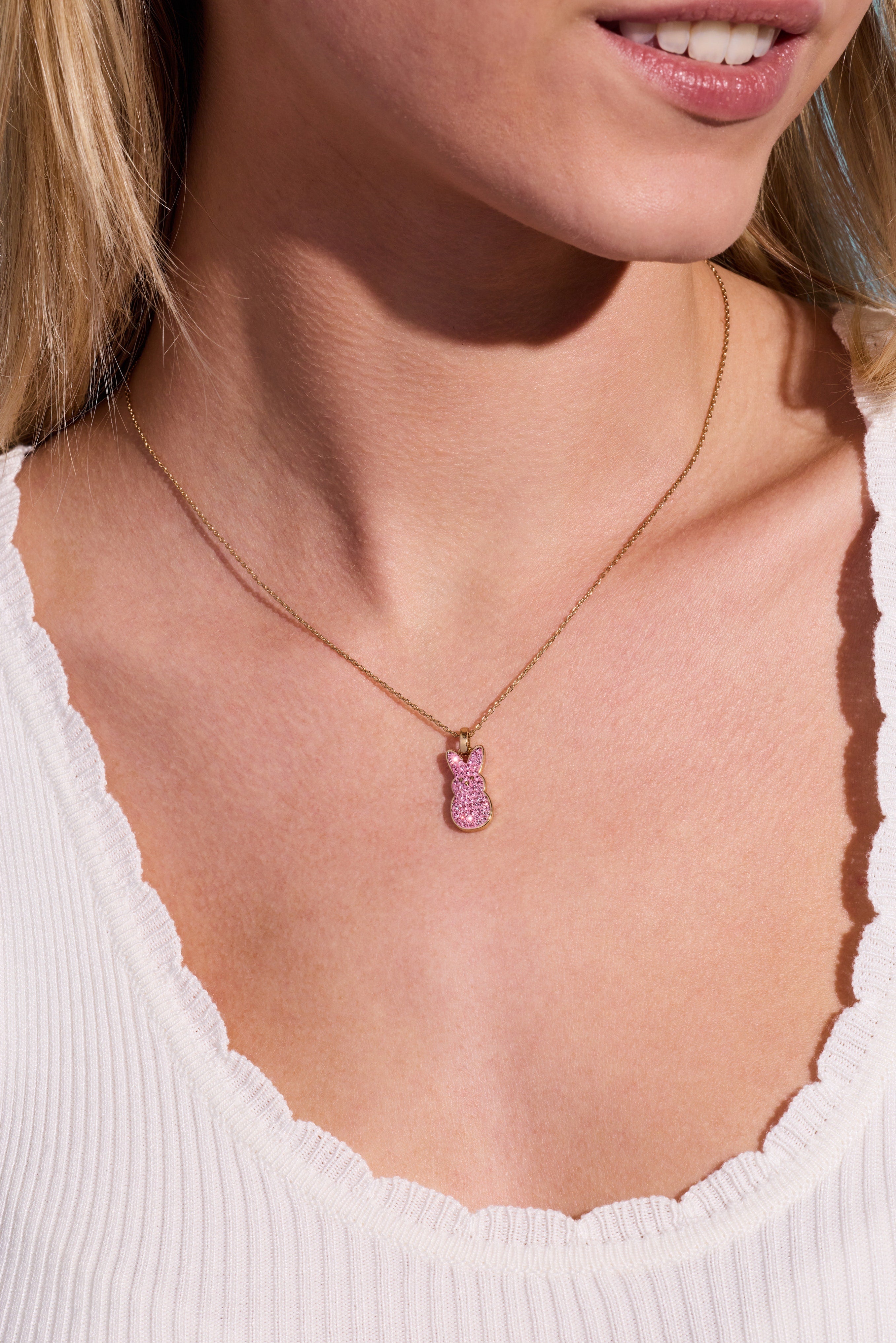 ALEX AND ANI Pink Crystal Bunny Pendant Necklace featuring a gold chain and a pink crystal bunny charm.