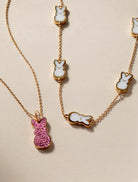 ALEX AND ANI Pink Crystal Bunny Pendant Necklace featuring a gold chain and a pink crystal bunny charm.