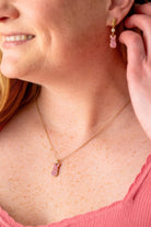 ALEX AND ANI Pink Crystal Bunny Pendant Necklace featuring a gold chain and a pink crystal bunny charm.