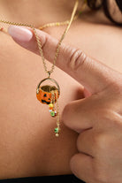 Gold 'Trick or Treat' layered necklace by ALEX AND ANI featuring Halloween-themed charms and delicate chain design.