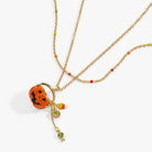 Gold 'Trick or Treat' layered necklace by ALEX AND ANI featuring Halloween-themed charms and intricate chain details.