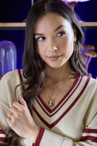 ALEX AND ANI Harry Potter™ Time Turner Spinner Necklace with gold-tone pendant featuring a magical time-turner design.