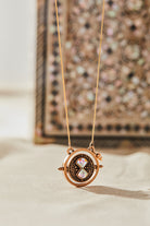 ALEX AND ANI Harry Potter™ Time Turner Spinner Necklace with gold-tone pendant featuring the iconic time turner design.