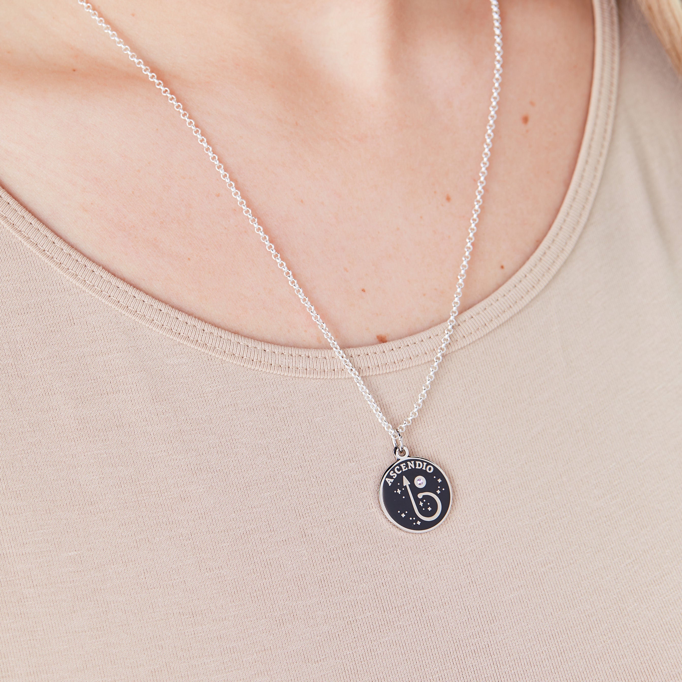 Shiny silver Harry Potter™ Ascendio necklace by ALEX AND ANI with adjustable chain and magical pendant.