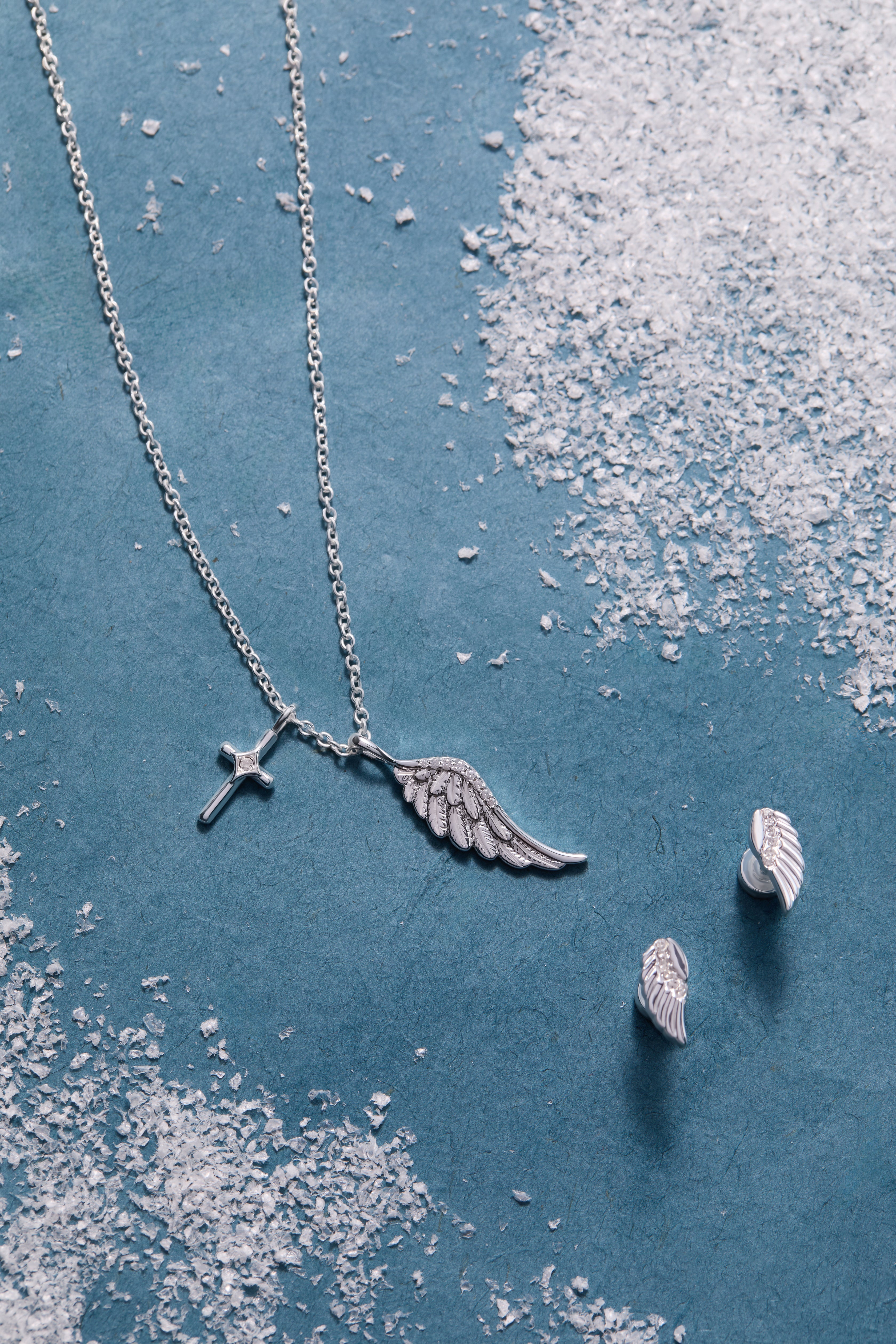 Silver Faith Cross and Angel Wing Charm Necklace by ALEX AND ANI featuring a delicate cross and angel wing pendant.