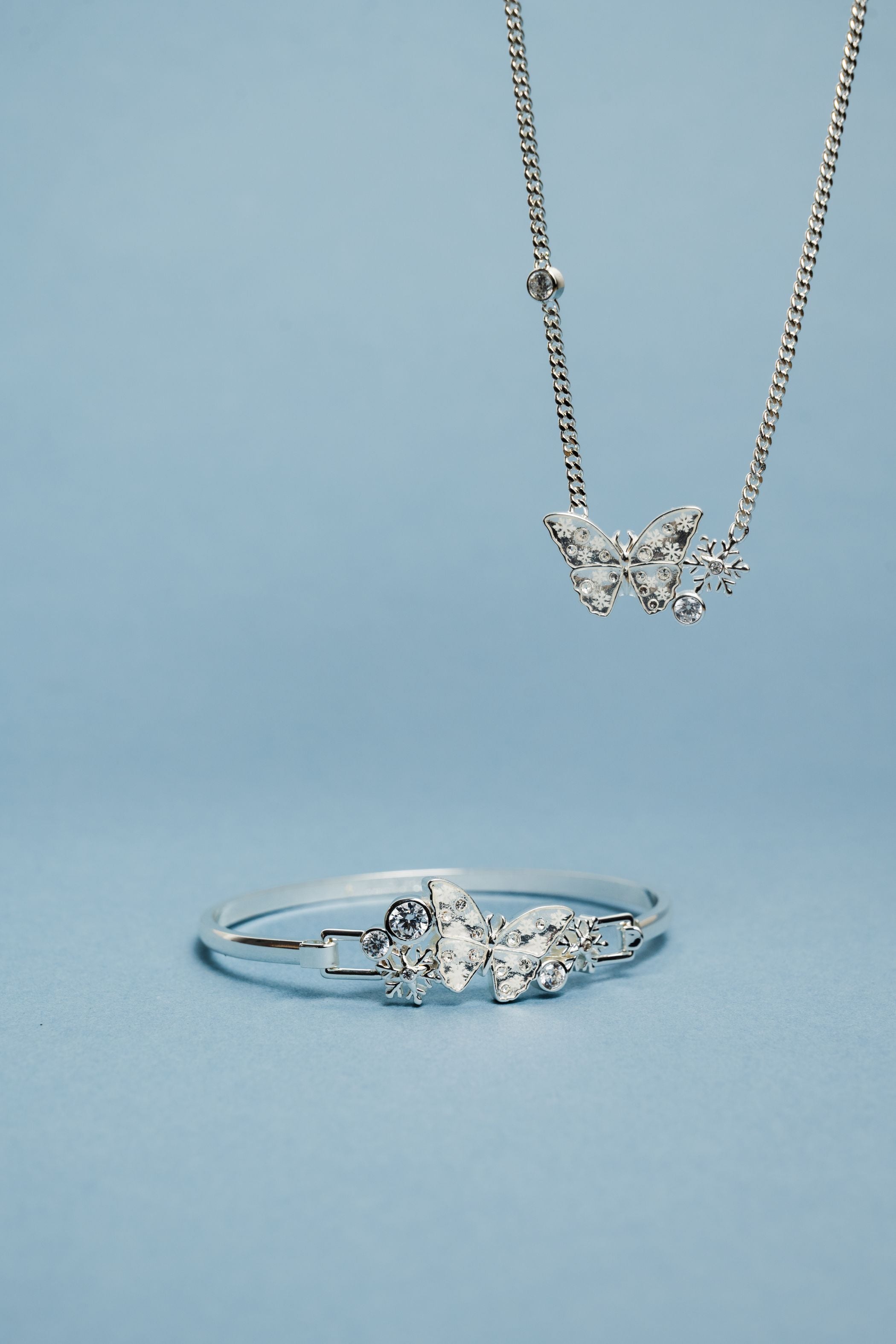 Silver glass butterfly inline necklace by ALEX AND ANI, featuring a delicate butterfly pendant on a sleek chain.