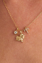 Gold stainless steel Aries zodiac charm cluster necklace by ALEX AND ANI featuring a celestial-inspired pendant.