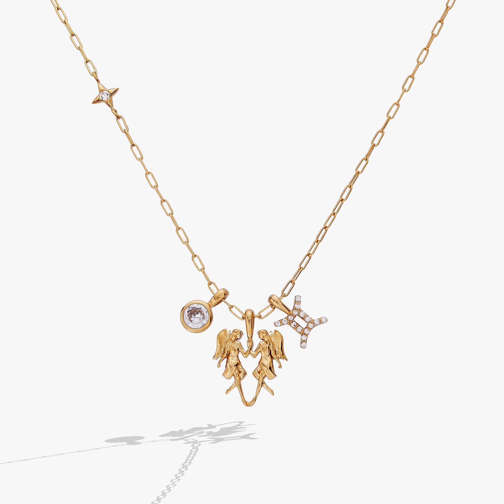 Gold stainless steel Gemini Zodiac Charm Cluster Necklace by ALEX AND ANI featuring celestial charms and intricate design.