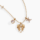 Gold stainless steel Gemini Zodiac Charm Cluster Necklace from ALEX AND ANI, featuring celestial charms and a delicate chain.